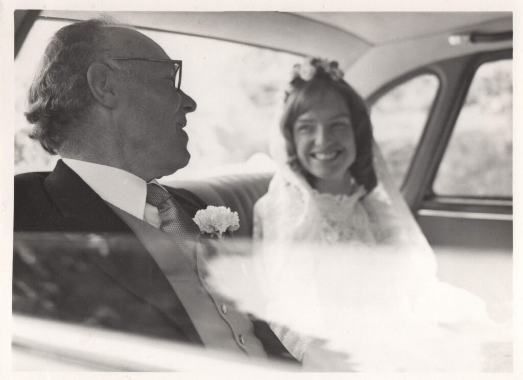 Old wedding photo in back of car