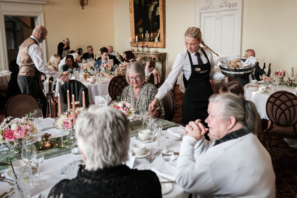 Serving wedding food at Fawsley Hall