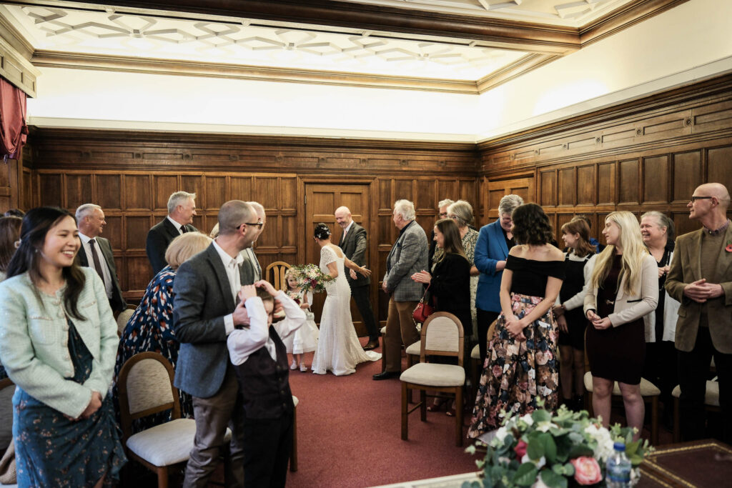 Fawsley Hall wedding couple walking down aisle