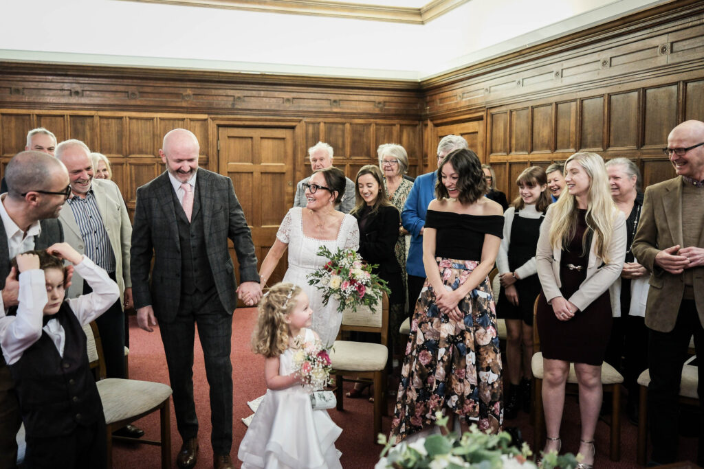 Wedding couple walk down aisle