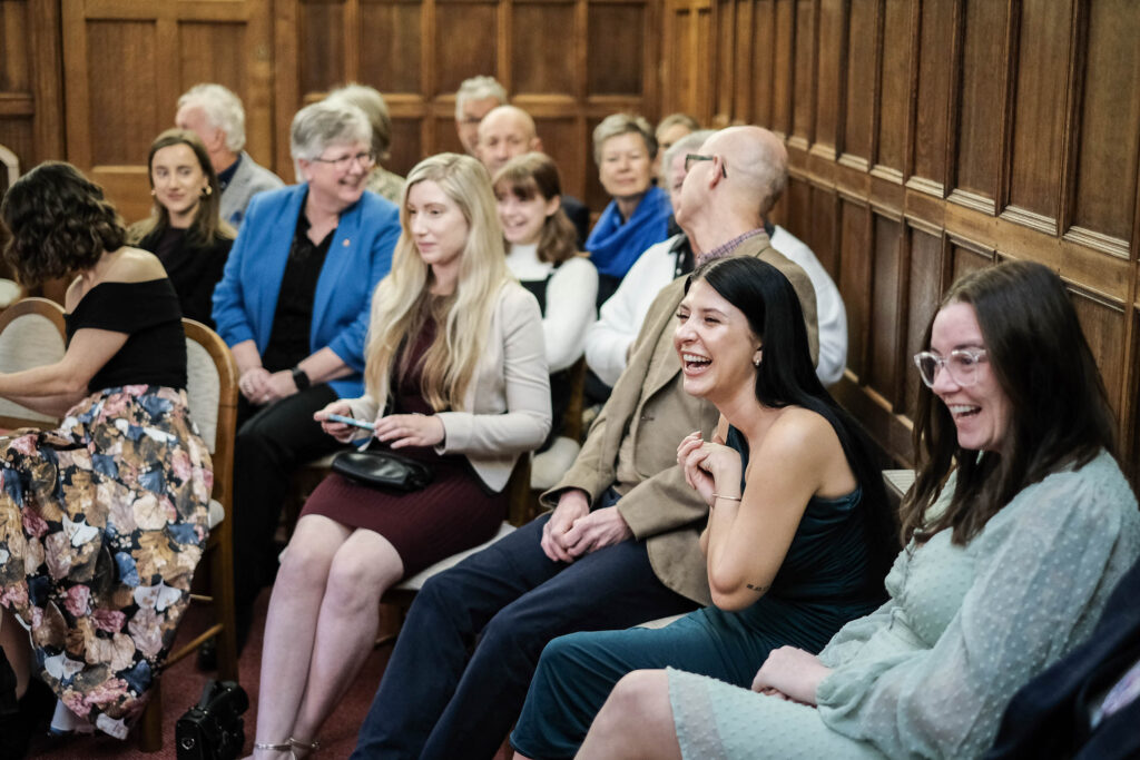 Wedding guests smiling