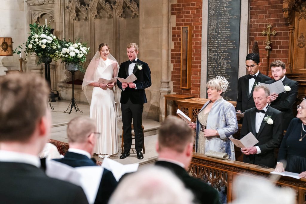 Singing at Selwyn College chapel, Cambridge wedding photography